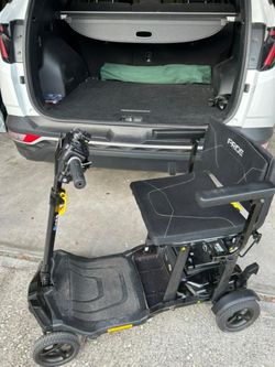 Bought brand new 2025 - lithium batter and charger included - 49 lbs folded