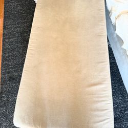 Living Spaces Ottoman That Opens Up For Storage Purposes.