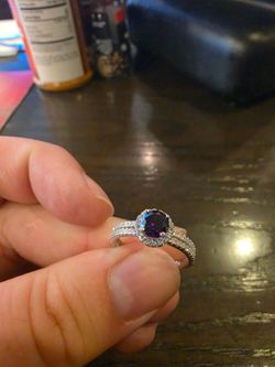 Sterling silver ring with purple gemstone