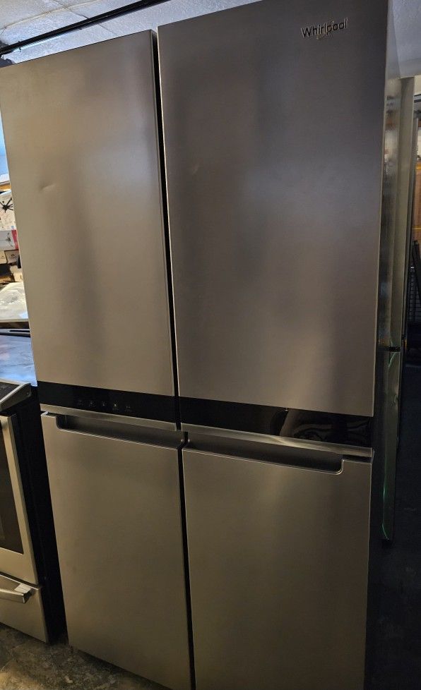 WHIRLPOOL STAINLESS STEEL 4 DOORS REFRIGERATOR...COUNTER DEPTH....WITH ICE MAKER INSIDE....$ 550