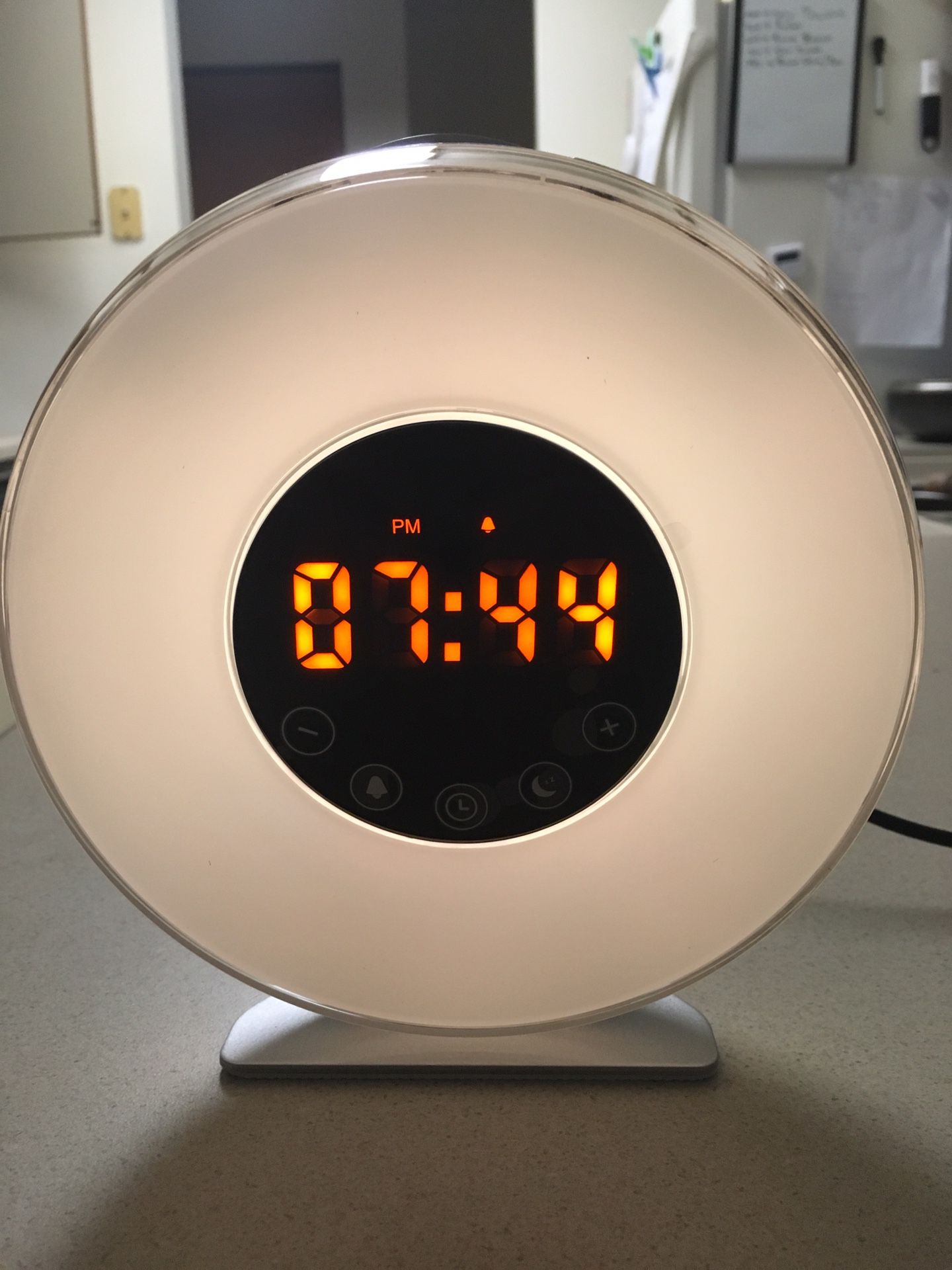 Alarm Clock with sunrise wake up..gradually wakes you up with soothing sunlight simulation. FM radio function also available for waking up or just pl