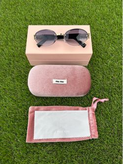 Miu Miu Rounded Sunglasses