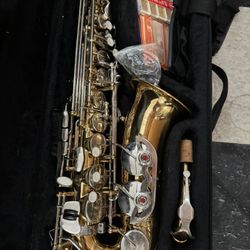 Saxophone With Case And Accessories 