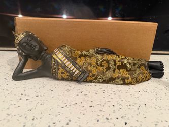Reclining Buddha Figurine with Gold Fabric Robe
