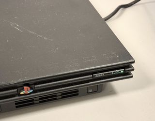 Sony PlayStation 2 PS2 Slim Console, 1 game & cords only.