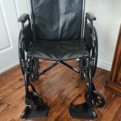 DRIVE WHEELCHAIR.   BLACK, LEG EXTENDERS. EXCELLENT CONDITION! LIKE NEW!!!