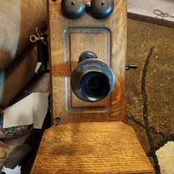 Antique kellogg wallmounted telephone