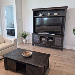 Coffee table Farmhouse weather charcoal rectangular Lift Top with casters brand is Magnussen