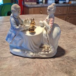 Porcelain Asian Couple Figurine with Gold Accents