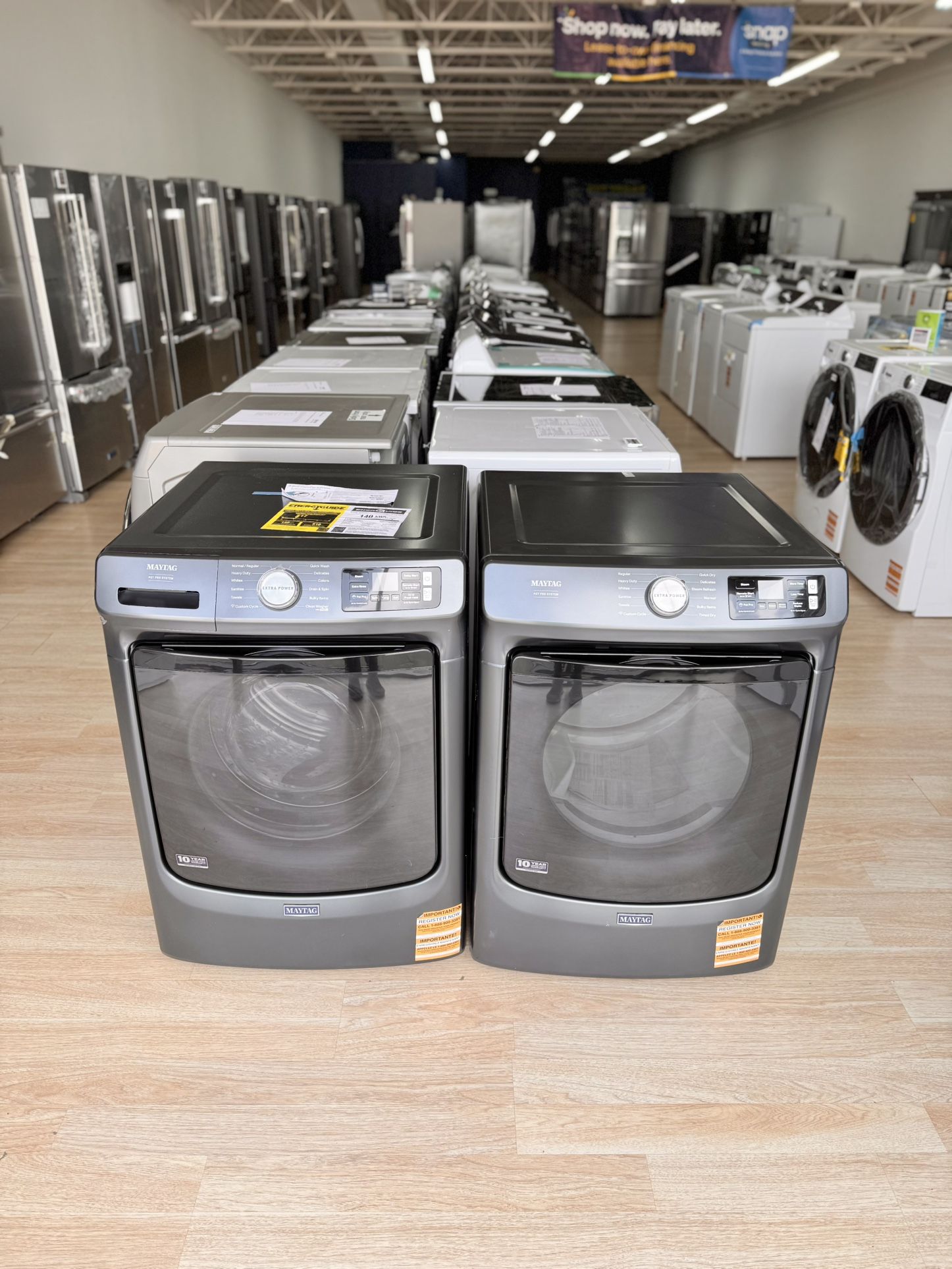 Brand-new Maytag Smart Pet Pro Washer (5.0 cu. ft.) and Gas Dryer (7.4 cu. ft.) in Midnight Steel.
