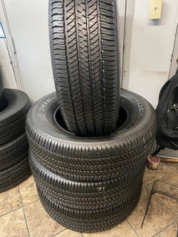 SET 255/70/18 BRIDGESTONE DULER SEMI NEW 95%TREAD LIFE 300 PRICE INCLUDE PROFESSIONAL INSTALLATION AND TAX