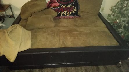 Couch with frame to convert to bed