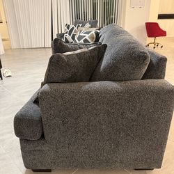 Grey sofa set with pillows and sectional