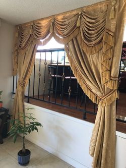 This’s a curtain includes the valance, and the curtain itself is double-layered with a blackout lining. This is the best price you can get.