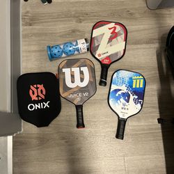 3 Lightly used Pickleball paddles- 2 adult, 1 junior