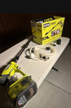 Ryobi 18-Volt Brushless EZClean 600 PSI 0.7 GPM Cordless battery charger.