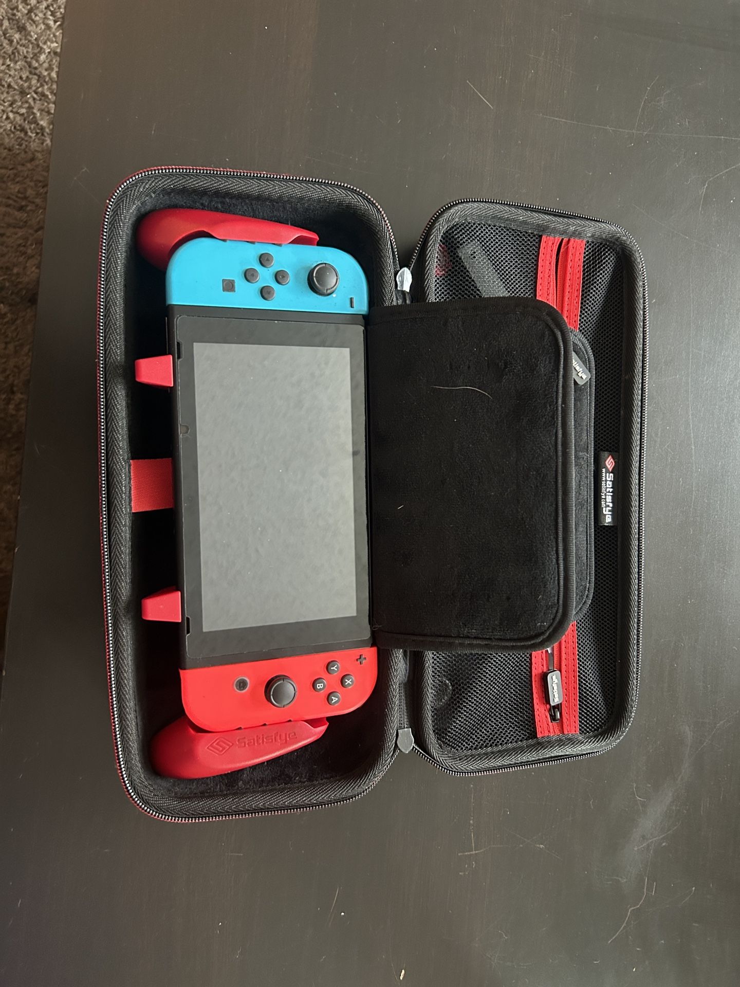 Nintendo switch with grip and case and memory card