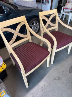 Two padded lawn chairs porch
