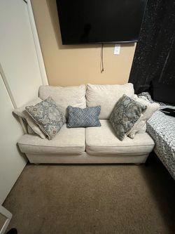 Cream Fabric Loveseat with Throw Pillows