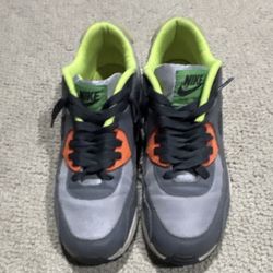 Gray, green, orange, and black nike air maxes 7 men’s