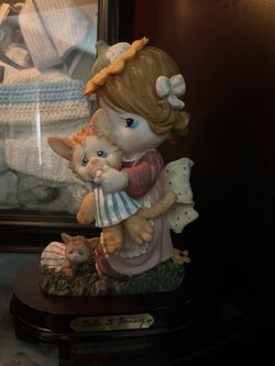 vintage Precious Moments "Belle & Benny" porcelain figurine depicting a girl holding a kitten.