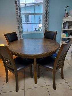 Juego de comedor redondo de 4 sillas