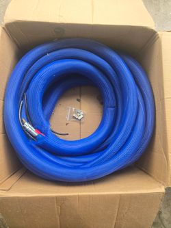 Heated hoses for spray foam