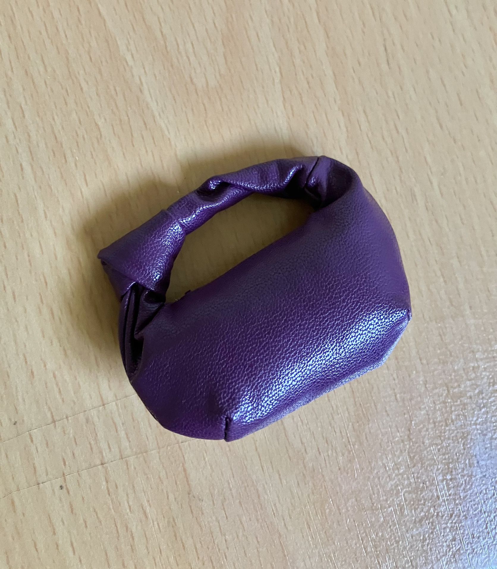 2020 W Club Exclusive NU. Face™ Collection: Plum-Tone Faux-Leather Knot Bag