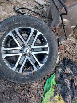 Ford "alluminum.rim and tire. "