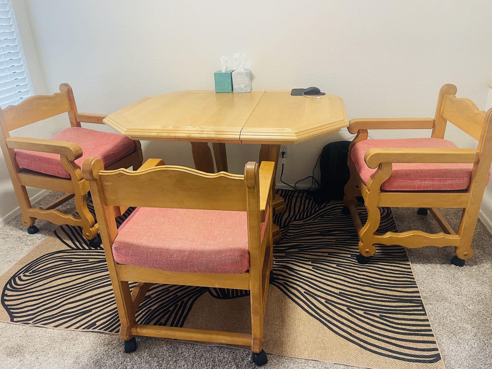 4 Chairs on Rollers & Table Dinning Set.