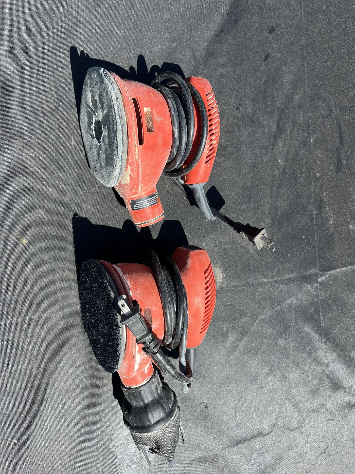 Two Black+Decker 120V 60Hz Sanders