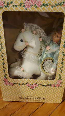 New-Crowne Fine Porcelain doll