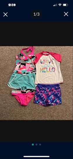 Girl size 10-12 and 12 new swimsuit