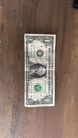 SIGNED dollar bill by the Jordan Robertson