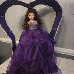 Porcelain Doll in Purple Dress