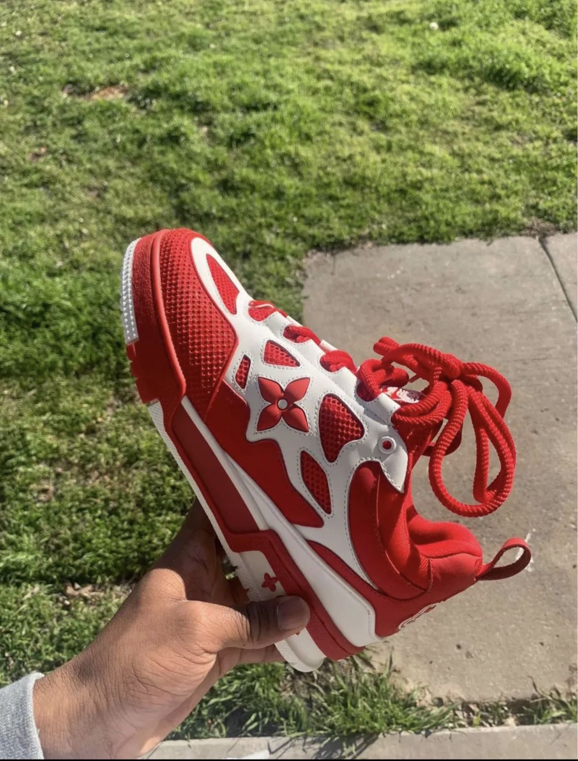 lv trainer sneaker red and white