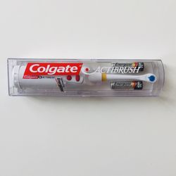 ACTIBRUSH. Colgate electric toothbrush. Very efficient. Brand new. Never used. Still in original packaging/travel case.