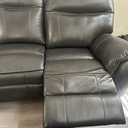 Six Piece Gray Leather Sectional With Ottoman