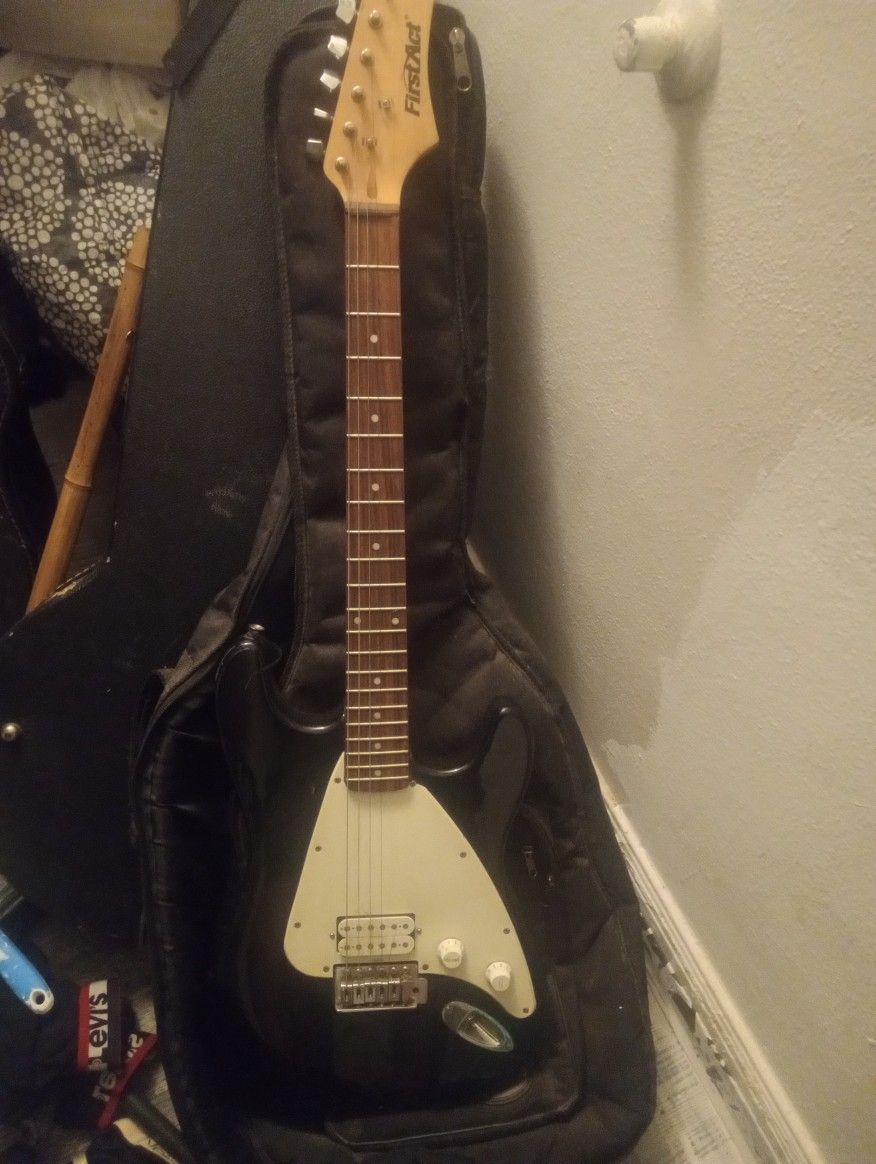 First Act Electric Guitar. ( Perfect Situationally Shape)