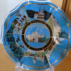 Disneyland vintage souvenir plate blue And Gold ruffled edge 6 scenes of park VG

