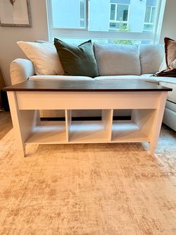 Coffee table with lift top for extra storage