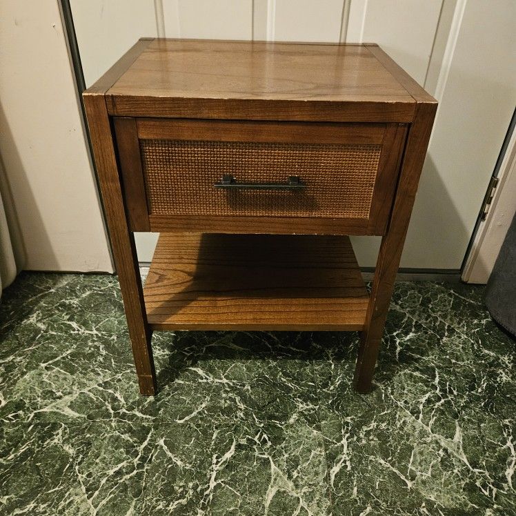 Real wood end table with pull out drawer. 18" X 15" and 23" tall