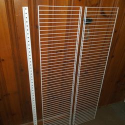 2 wire shelves and the metal support bracket.
