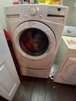 LG FRONT LOAD WASHER WITH PEDESTAL $275/OBO