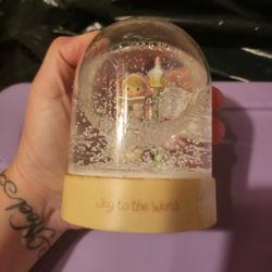 Precious moments snow Globe 