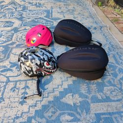 2 Giro Helmets With 2 Alpina Cases.