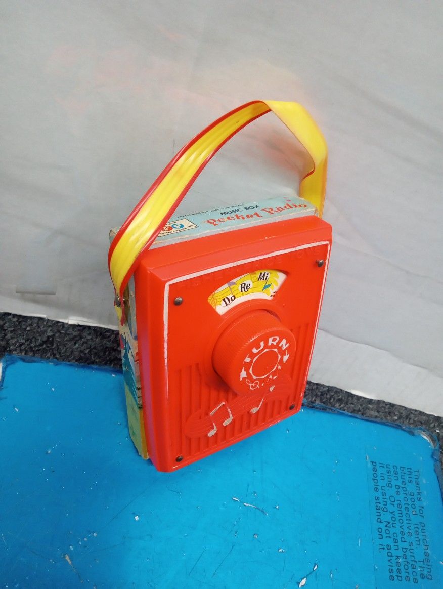 Vintage 1969 Fisher Price Wind Up Pocket Radio Music Box 'Do Re Mi' 759 Works!