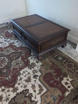 Ethan Allen cocktail table leather top, storage drawers