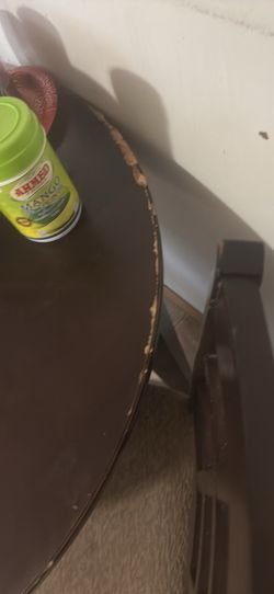 Dining table set with a bit of chipping with 3 chairs 2 of them perfect 1 has paint on it
