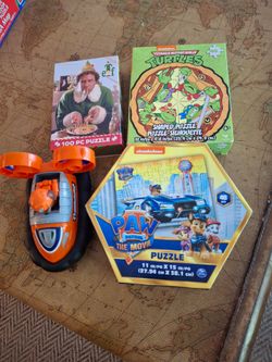 Three puzzles & a paw Patrol toy